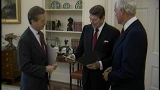 President Reagan during a Photo Op and Receiving a Message from Congress on November 15, 1985