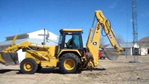 Heavy Equipment Operator Michael Constantin demonstrating backhoe start up procedures.