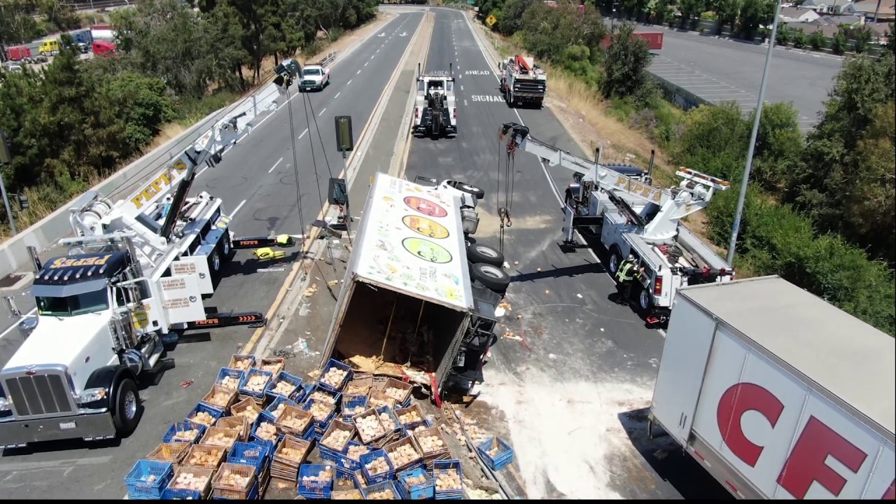 Bitchin' rollover! Loaded box truck spills sauce everywhere Bitchin' rollover! Loaded box truck spills sauce everywhere