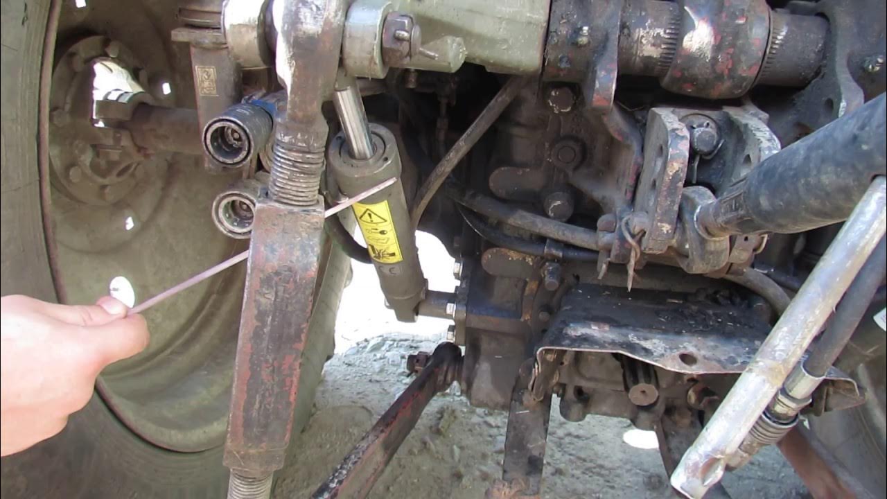 Распределитель шантуй 16 недержет навеска. Навеска трактора мтз 82. Почему не держит навеска. Сапун мтз 1221. 1.