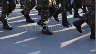 Download this Footage: http://bit.ly/1r033dz Close up with soldiers footsteps marching in cadence, on the war road. Please rate if 