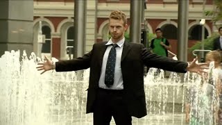 Business man dances in a water fountain!