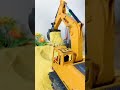 excavator put on sand on the truck, excavator daily work