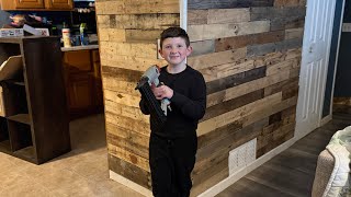 Pallet board wall “so easy a kid can do it”