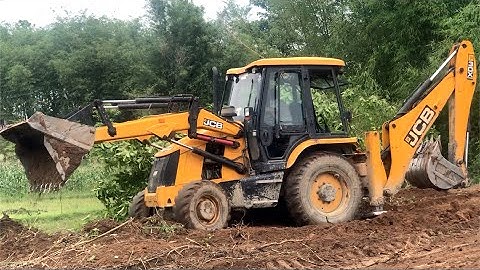 Adjusting The Soil Level of The Village Field JCB Backhoe 3DX Machine