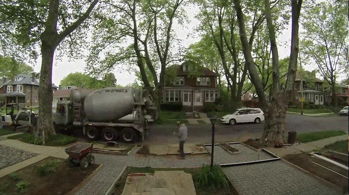 Timelapse of concrete sidewalk pouring and finishing