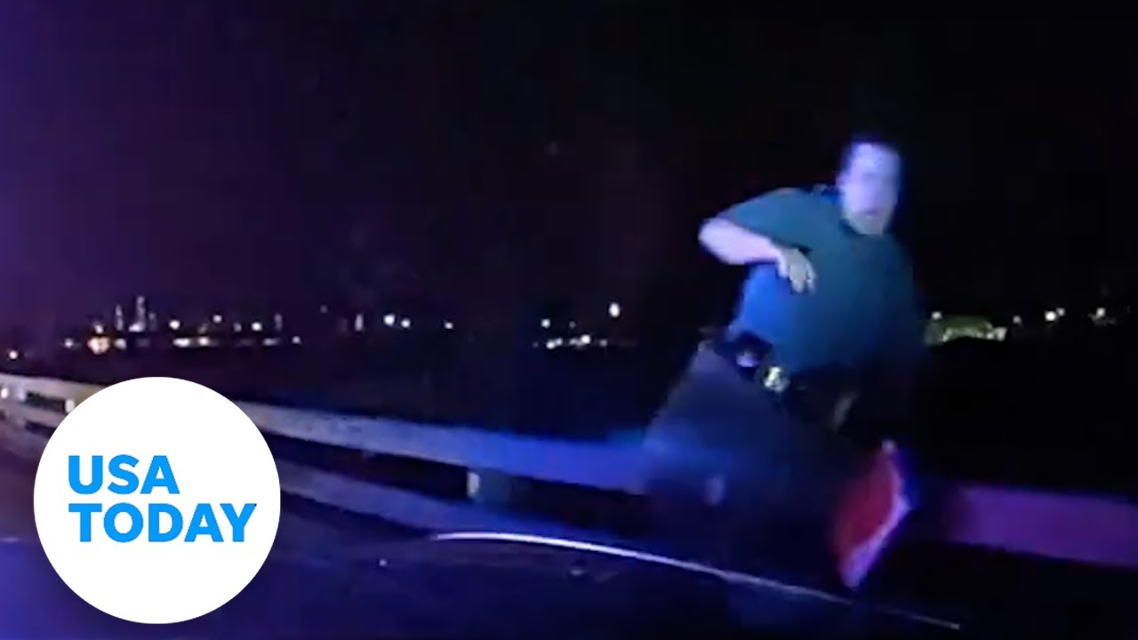 Dashcam shows trooper jumping off bridge to avoid chain-reaction crash | USA TODAY