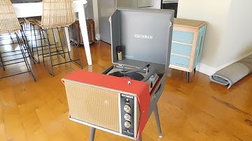 Columbia 4 speed automatic portable record player playing a 78 RPM record.