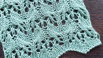 Оригинальный ажурный узор спицами с листиками