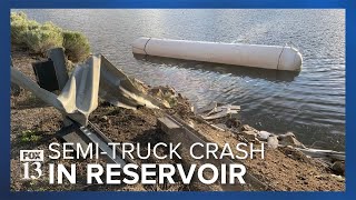 Recovery for driver continues after semi-truck crashes into reservoir