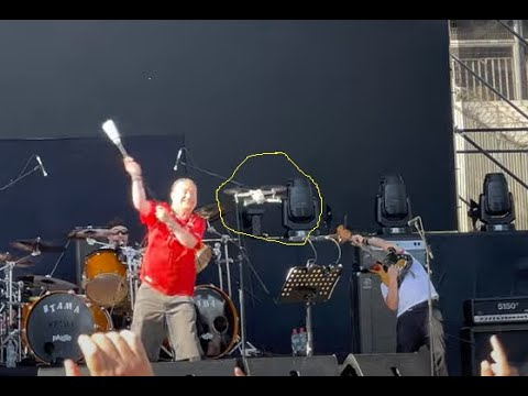 Mike Patton of Mr Bungle tried to hit a drone w/ his mic during live show