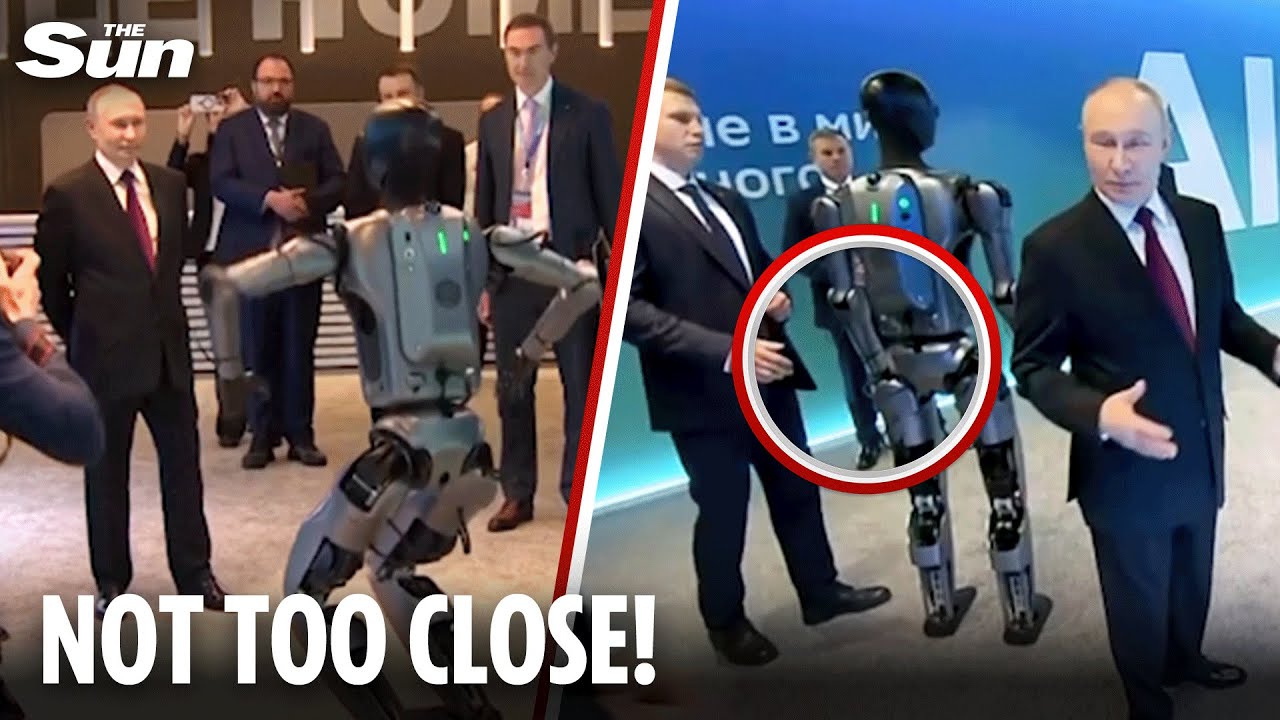 Bizarre moment Putin’s panicked henchman pushes humanoid bot away from dictator
