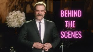 E! GLAMBOT: David Harbor BTS at SNL 50
