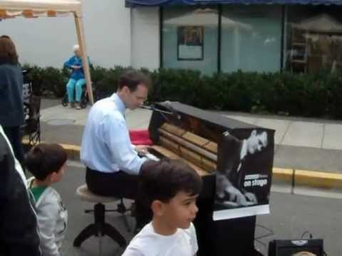 Piano player, entertainer, Dominik Heins at Farmer...