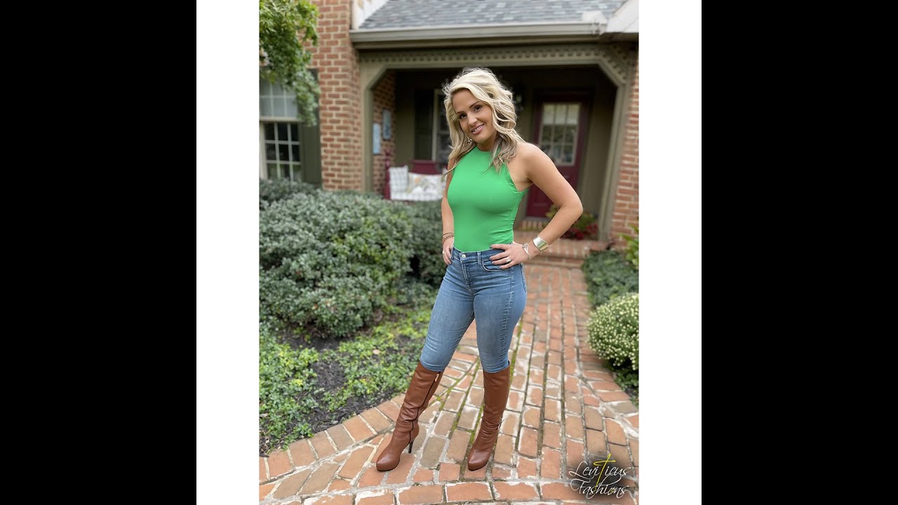 STYLIST EMILY FASHION MODELS REORIA GREEN TURTLENECK DENIM JEANS AND BROWN LEATHER  KNEE THIGH BOOTS