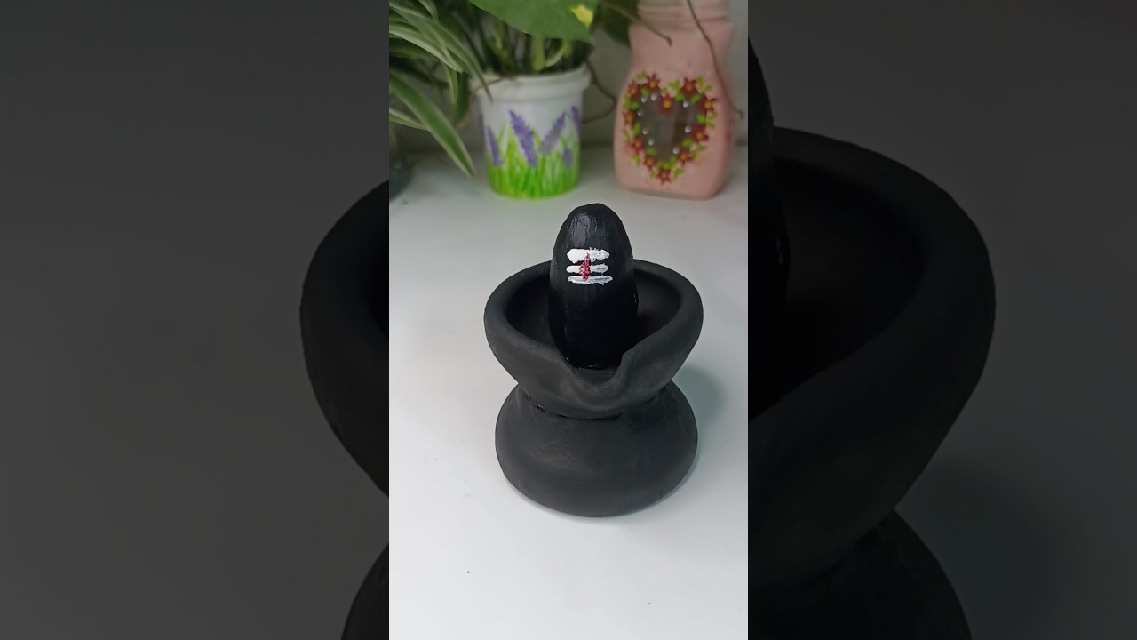 Sibling making with diya