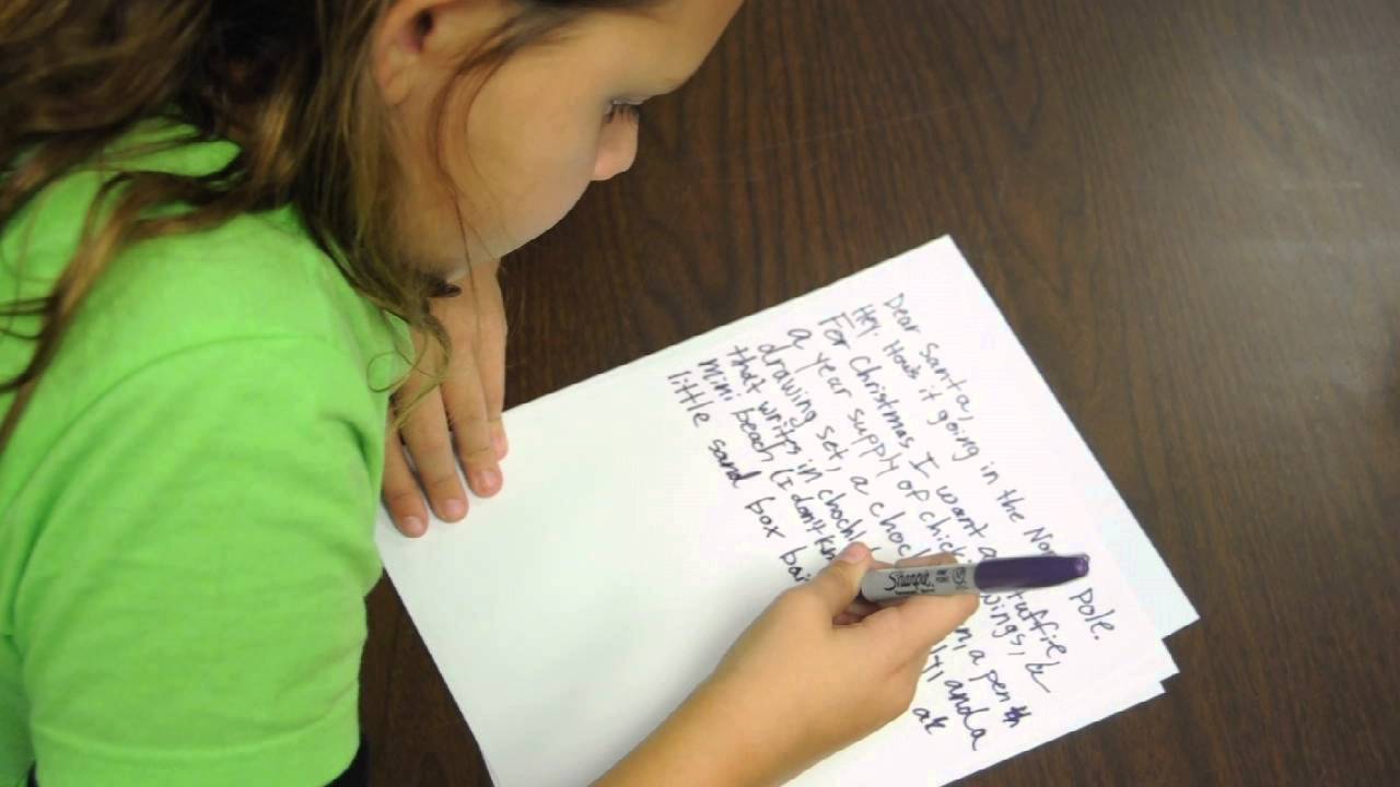 The kids write a letter to Santa