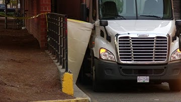 Fatal Collision in Grocery Store Loading Bay