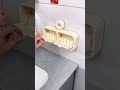 CHK This suction cup flip-top soap dish is not only attractive but also practical. It's space-sabing