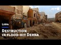 People Walk Amid Rubble In Libya S Flood Hit Derna AFP