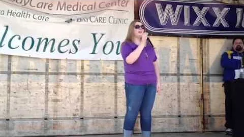 Haley Berger singing the National Anthem at the Ma...