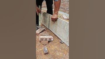 The wooden board is secured with iron wire to fix the nails.