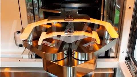 Wafer on tape and ring handled by dual arm robot