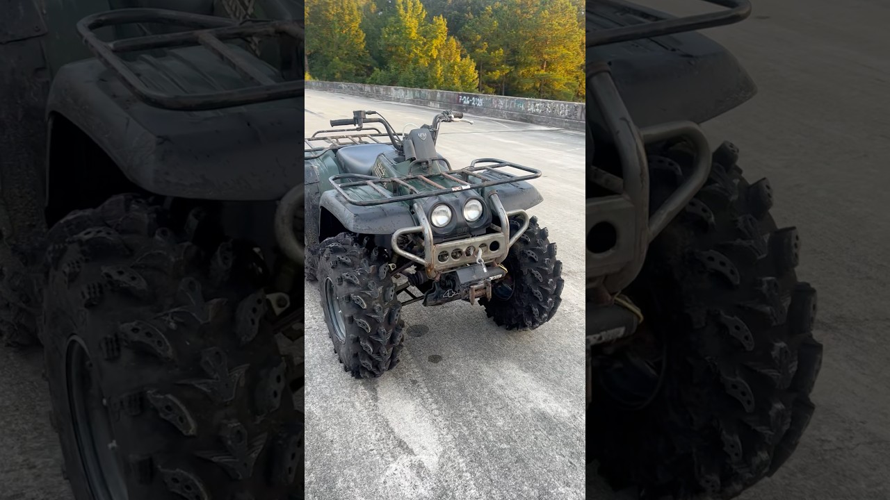 98 Kodiak 400 4x4 2” lift on 28” swamp lites 