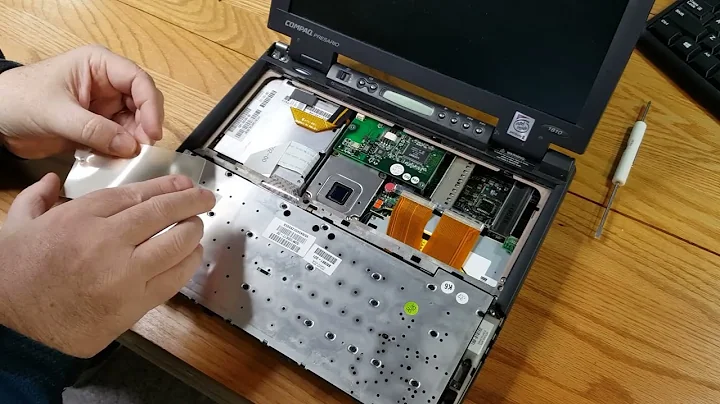 Compaq Presario 1810 laptop computer.  Full disassembly and reassembly for maintenance and repair.