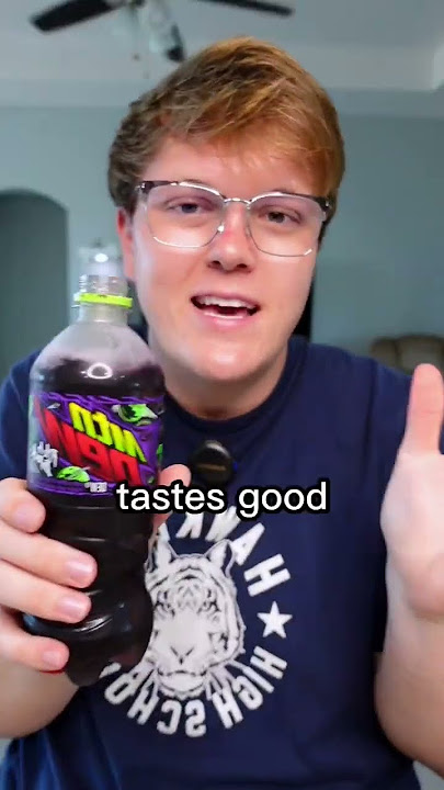 Trying PITCH BLACK Mountain Dew…