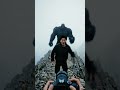 "Capturing the Summit! 📸⛰️ | Photographer Shoots a Lone Climber on a Misty Mountain Peak 🌫️🔥"