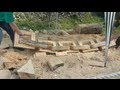 Chainsaw sculpture  making a link chain from a single log