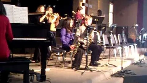Chelsea De La Cruz playing saxophone