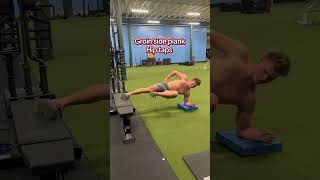 Groin side plank hip taps
