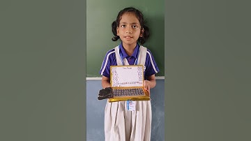 soumya sinha of class -IV with Tux Paint on her Laptop 💻