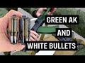 Who is the green ak given to and what do cartridges with white bullets mean