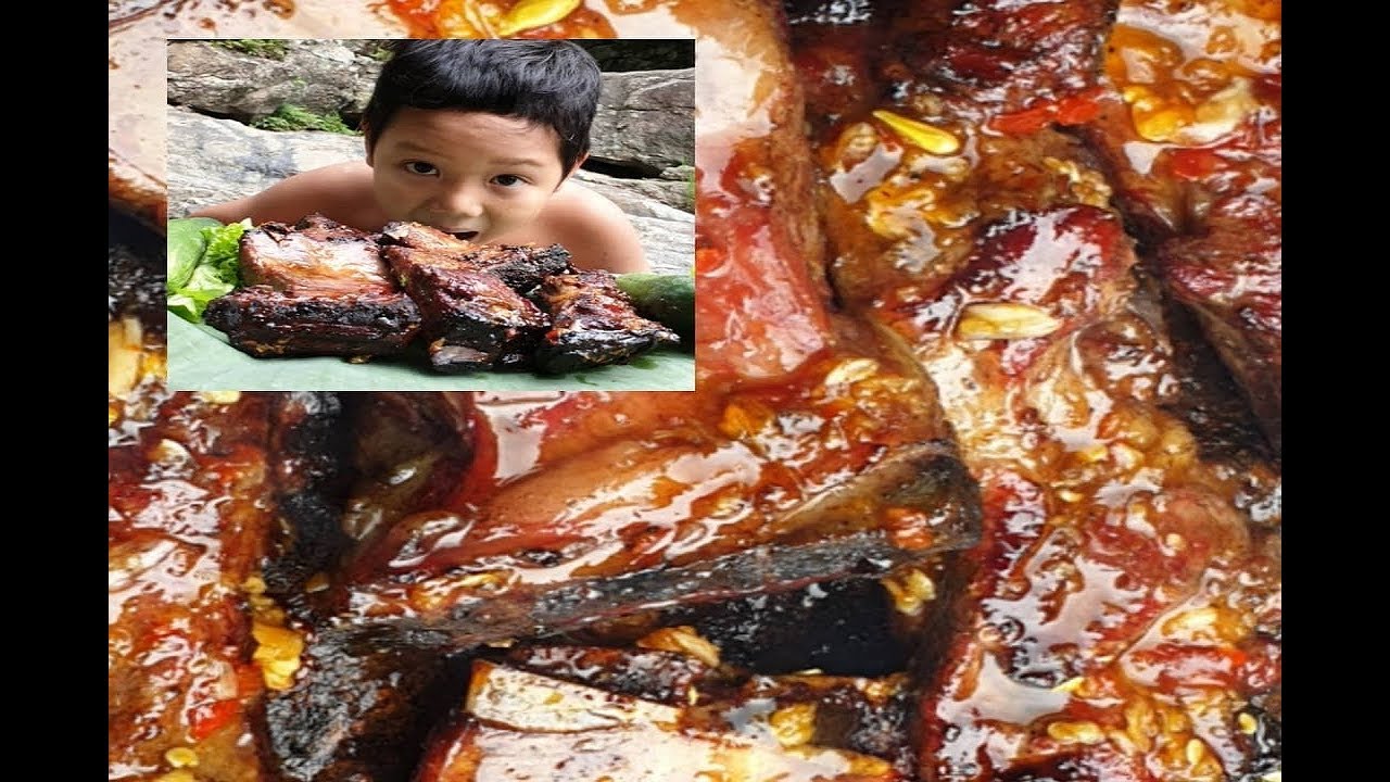 Eating Delicious Cooking Pork Rib On A Rock In Forest | Technology And Primitive