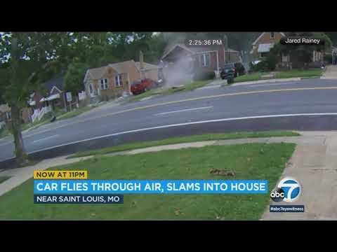 Video shows out-of-control car fly through air, slam into house - YouTube