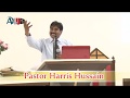 It is written    pastor harris hussain
