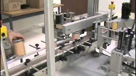 Quadrel | Labeling Systems | Pressure Sensitive Label Applicator | Labeling Round Containers