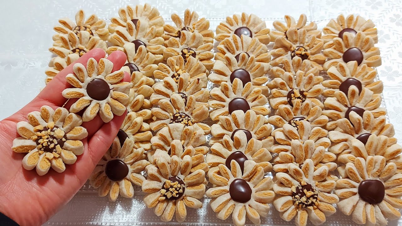 جدييد‼️حلوة الكاوكاو الشهيرة بحلة جديدة أكثر من 57حبة👌بدون طابع او مرشم ولا سكين😜