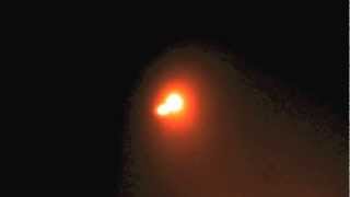 Comet 17P/Holmes passes in front of a background star