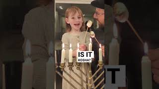 One is NOT allowed to use the Hanukkah candles for anything mundane. but the ninth candle may be...