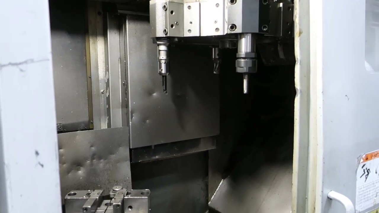 2012 OKUMA 2SP-V40 Twin Spindle CNC Vertical Lathe with 10
