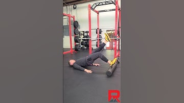 Single leg hamstring bridge on foam roller