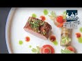 2 Michelin star chef Rolf Fliegauf creates lamb from Romandie with peppers and aubergine