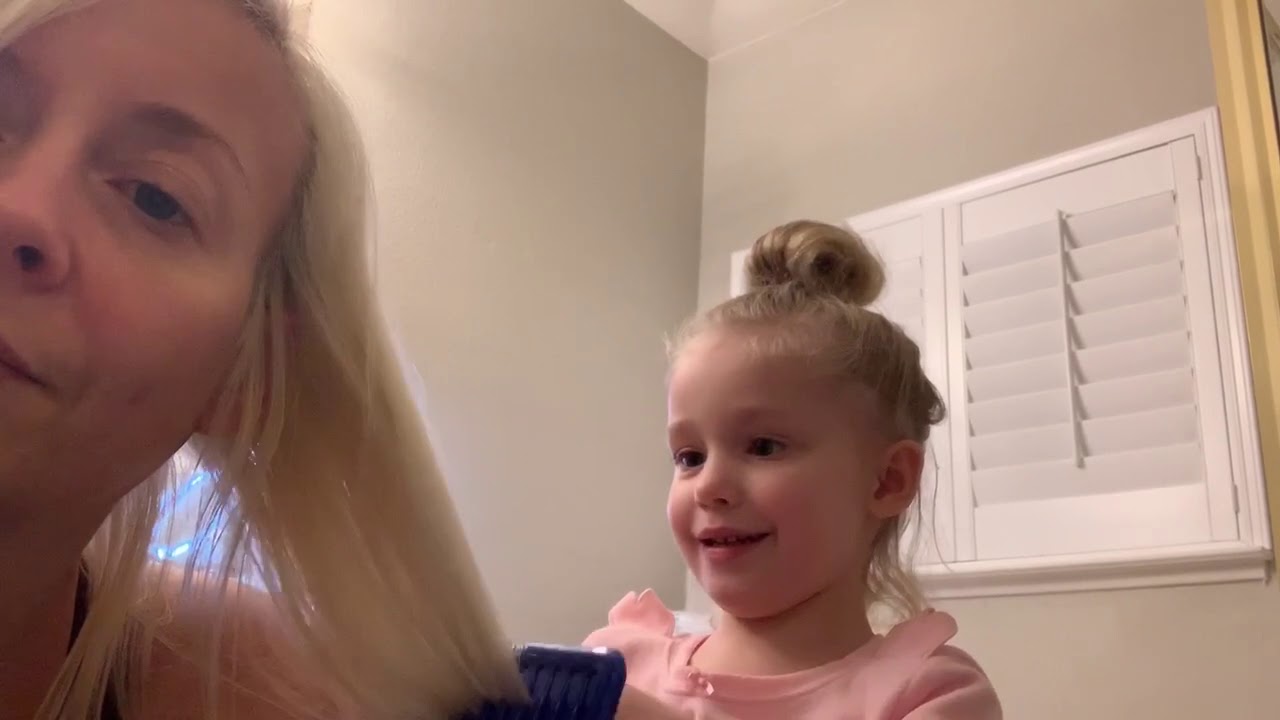 Riser doing moms hair