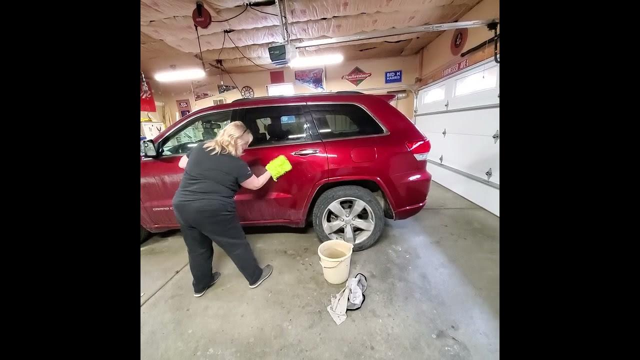 Vickie B Using Norwex car cloths and mitt to clean my car with just