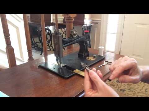 Threading an Early Elias Howe Sewing Machine