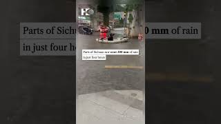 Chengdu Residents Wakeboard Through Flood After Downpour.